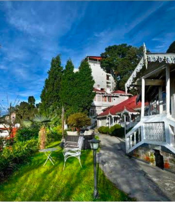 Summit Swiss Heritage Resort — colonial garden exterior