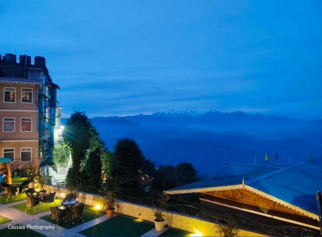 Summit Oakden Resort — blue hour exterior with Himalayan panorama