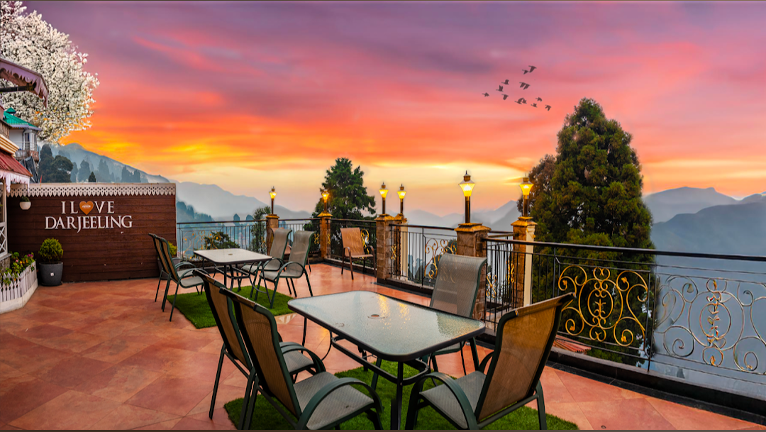 Summit Oakden Resort — I Love Darjeeling terrace at dramatic sunset