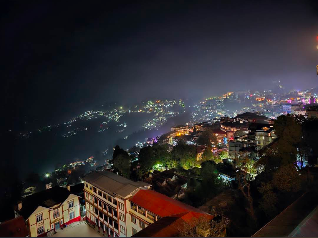 Summit Swiss Heritage Resort — aerial night view of resort